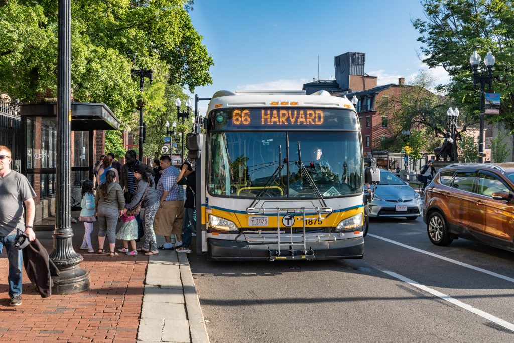 Customers alight from Bus 66 at Harvard Square